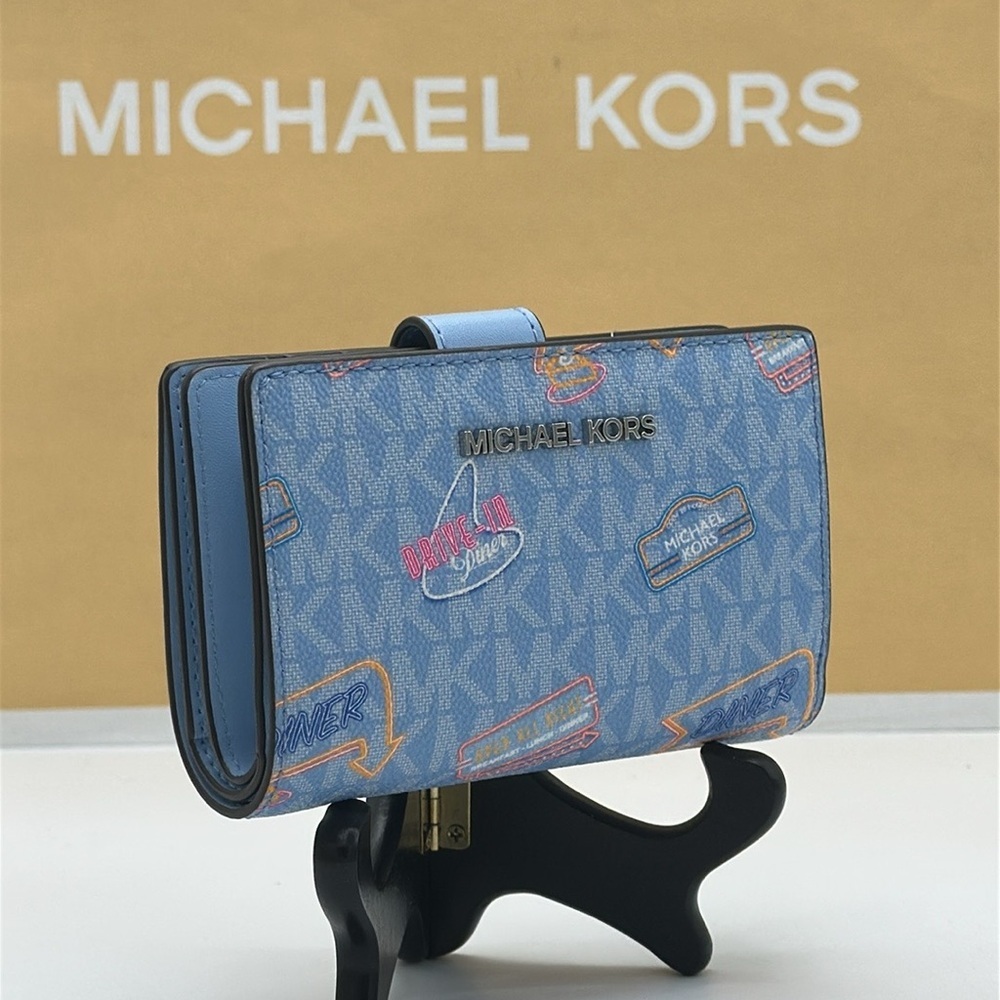 Michael Kors Jet Set Travel Medium Printed Signature Logo Bi-Fold Wallet
LT SKY - Picture 11 of 16